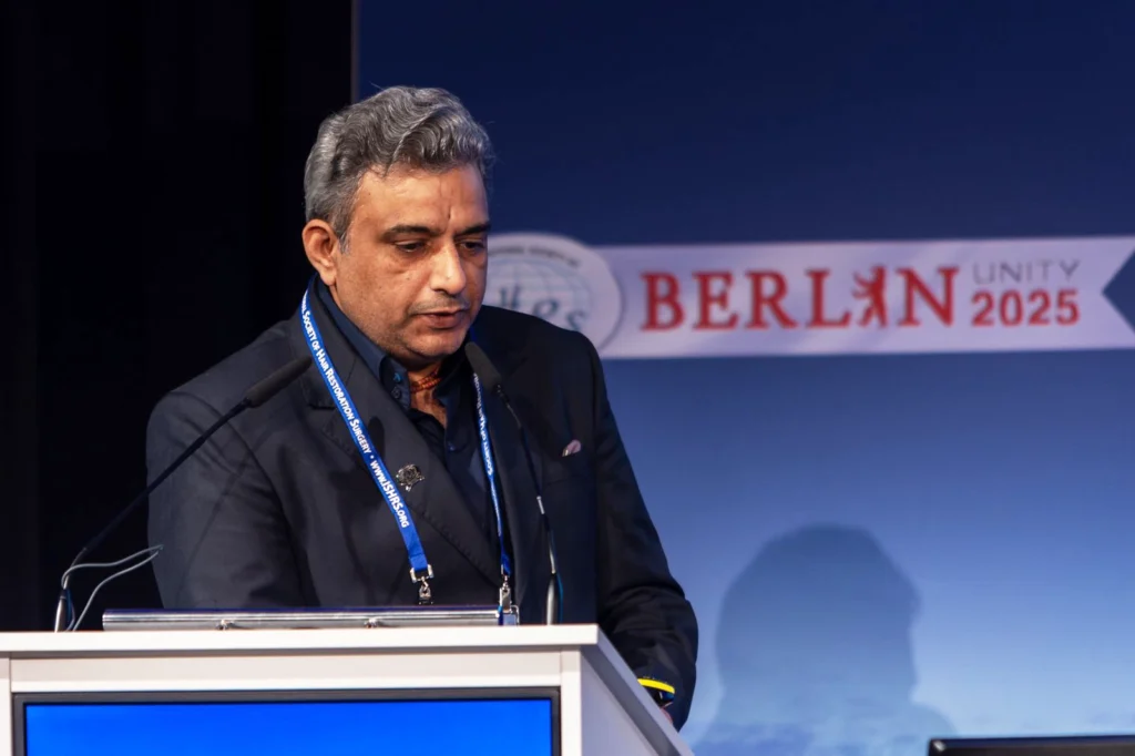 Dr. Satya Saraswat at 33rd ISHRS World Congress in Berlin, Germany